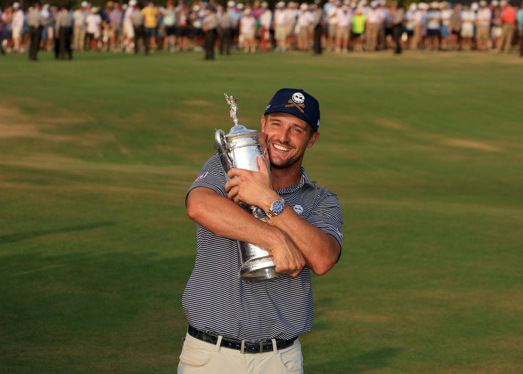 Bryson DeChambeau holds the US Open trophy after victory at Pinehurst